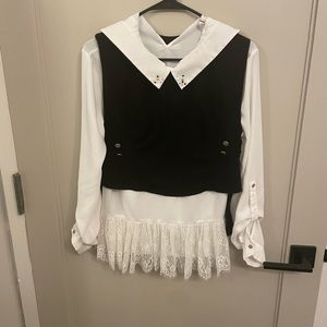 Gorgeous vest with white lace shirt